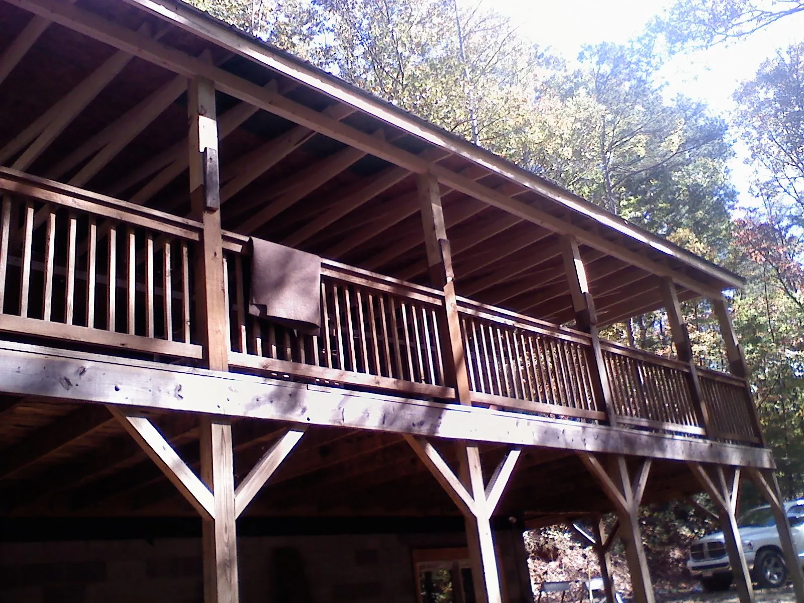 Timber framing under a new elevated porch and deck — Roof Leak Repair in Hilo by Roofing Brothers